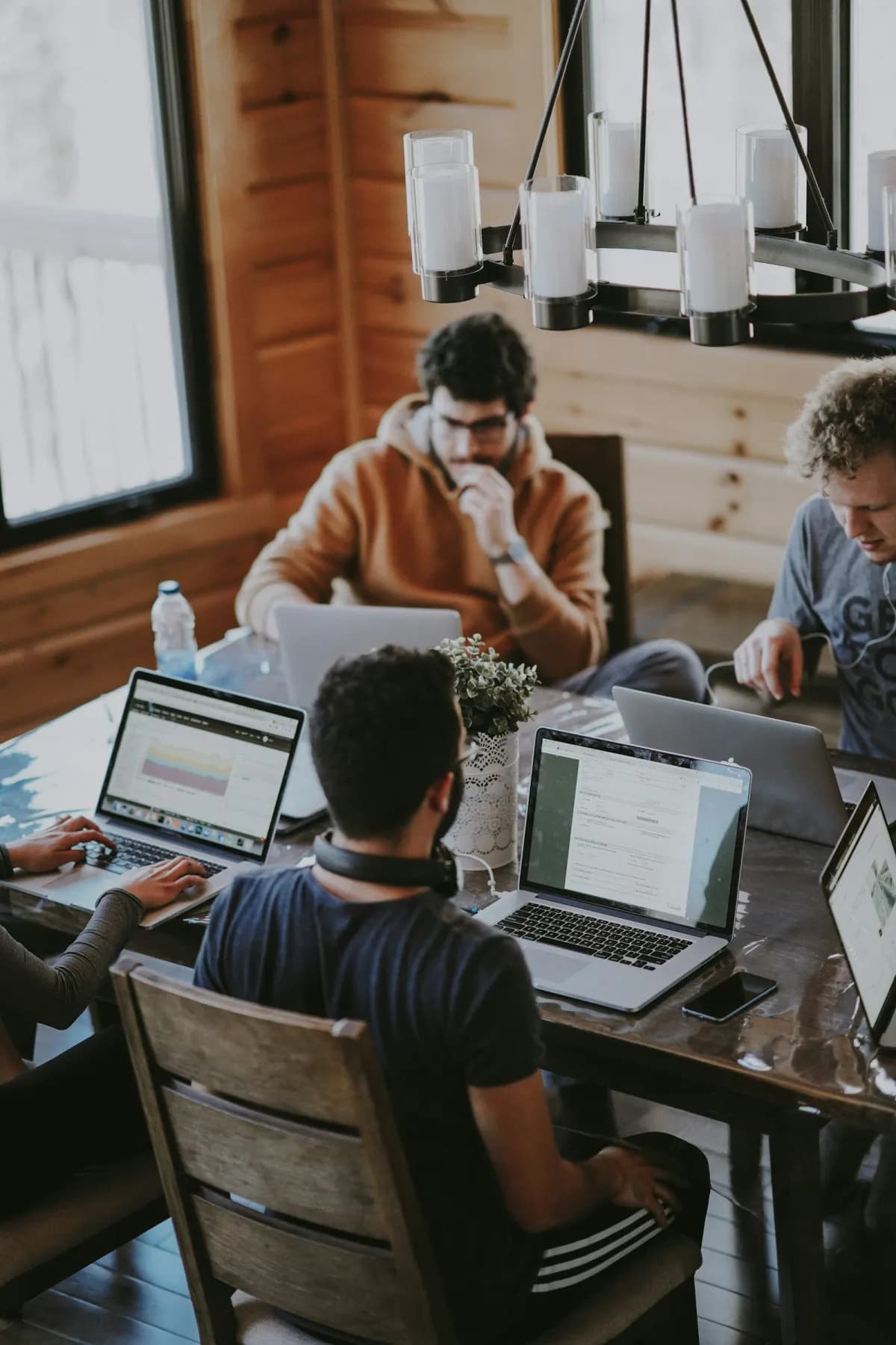 A product team collaborating around a table